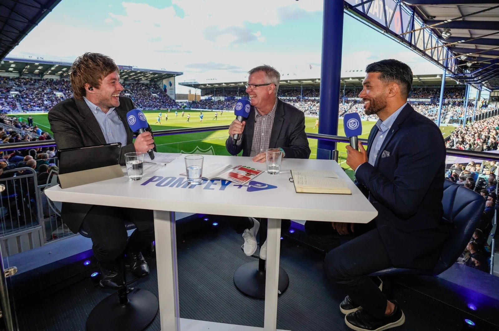Pompey+ presenters interviewing guests pitchside at Fratton Park for Portsmouth FC's live pre-match show